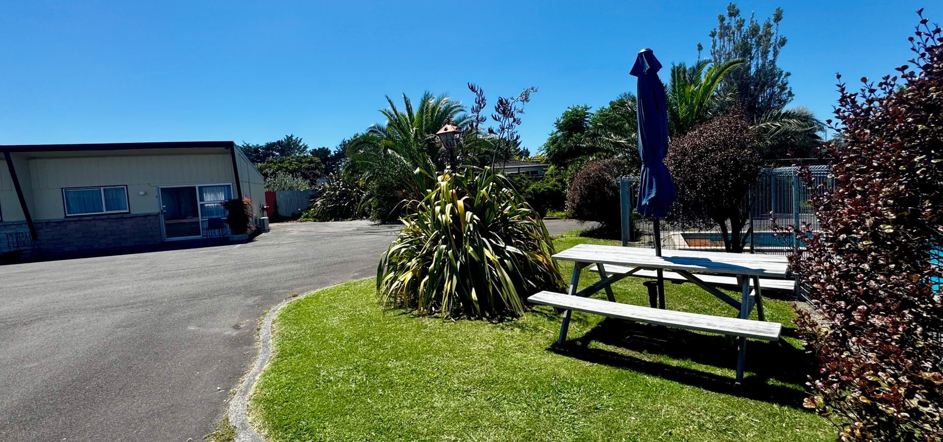 Spanish Lady Motel exterior with ground-floor units and off-street parking in Napier